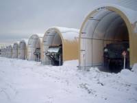 camel tri star max containment systems with canopies in the snow