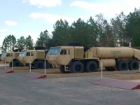 multiple modular secondary containment systems set up with vehicles