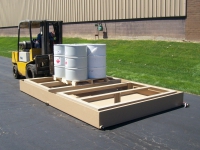 fuel being moved an envirohut spill containment panels