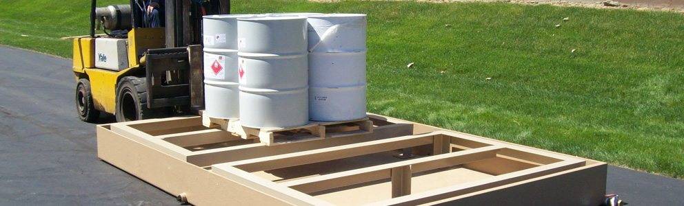 portable spill containment system transported with material barrels